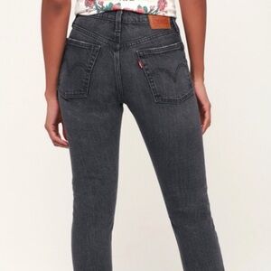 Levi’s 501 Washed Black High Rise Raw Hem Skinny